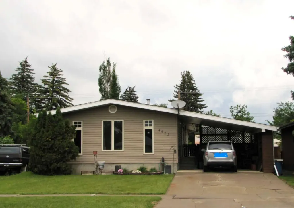 4923 52 Avenue Taber AB T1G 1H6