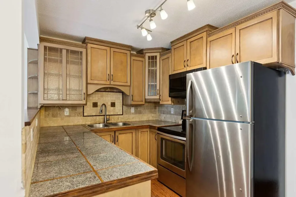 902 Harvest Hills Drive NE Calgary AB T3K 4L3