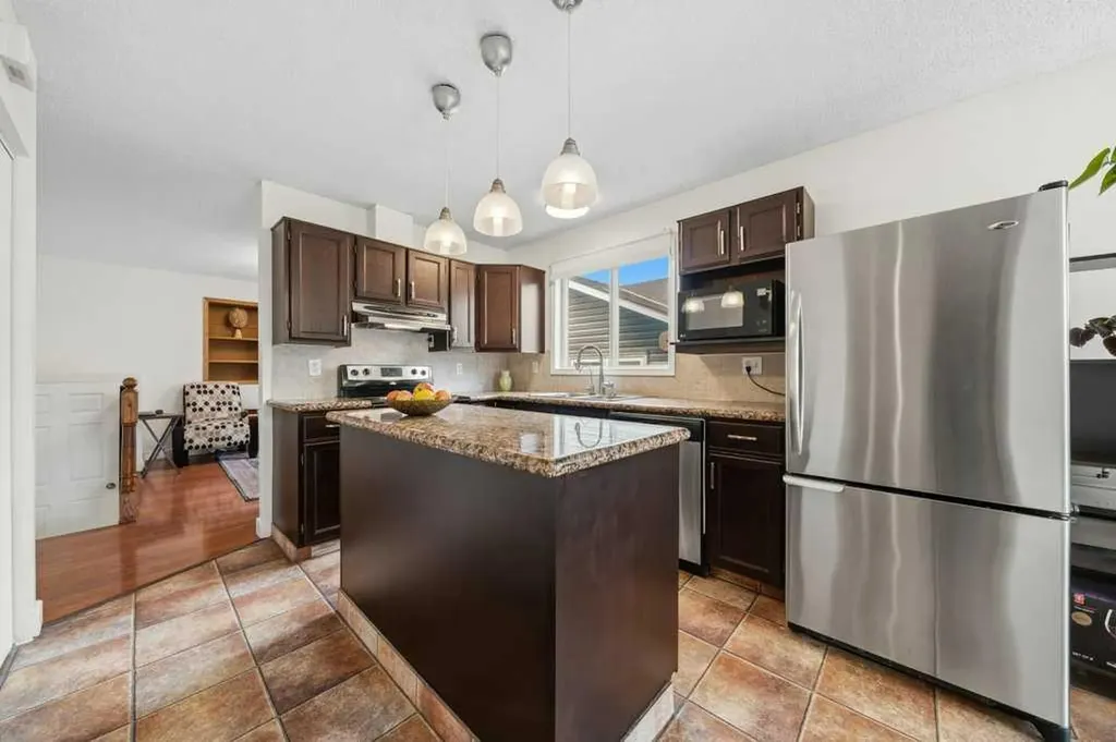 112 Cedargrove Way SW Calgary AB T2W 4V2