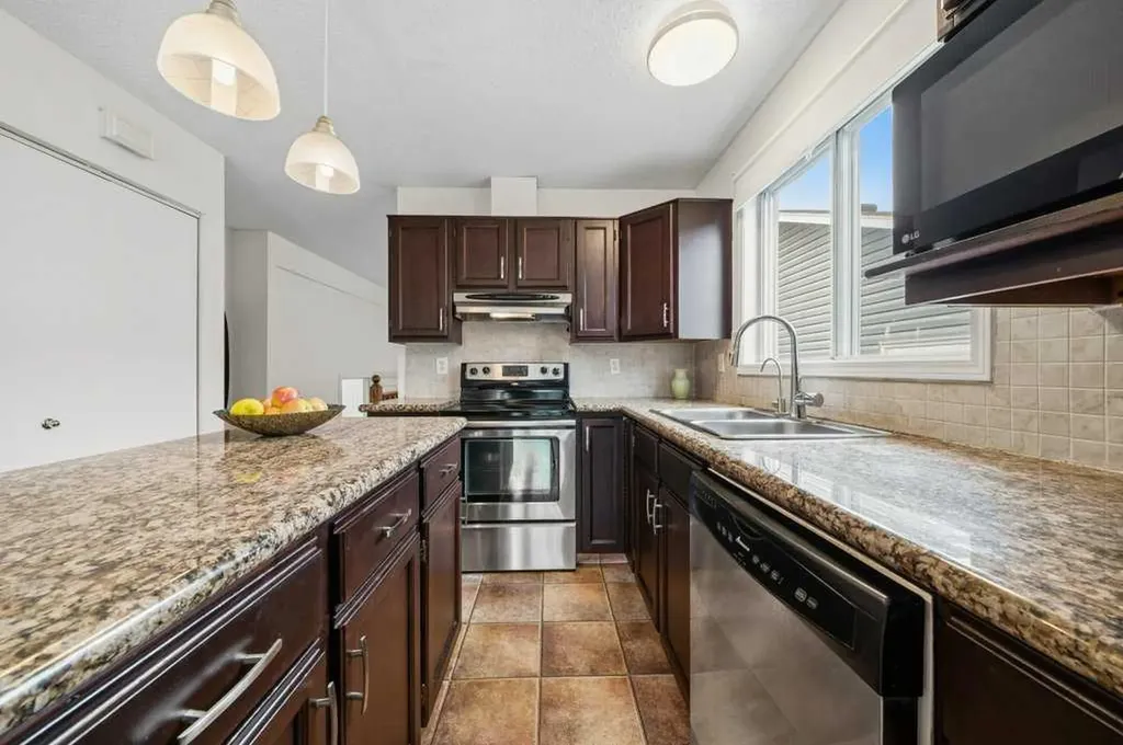 112 Cedargrove Way SW Calgary AB T2W 4V2