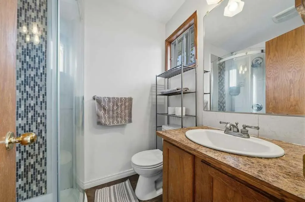 112 Cedargrove Way SW Calgary AB T2W 4V2