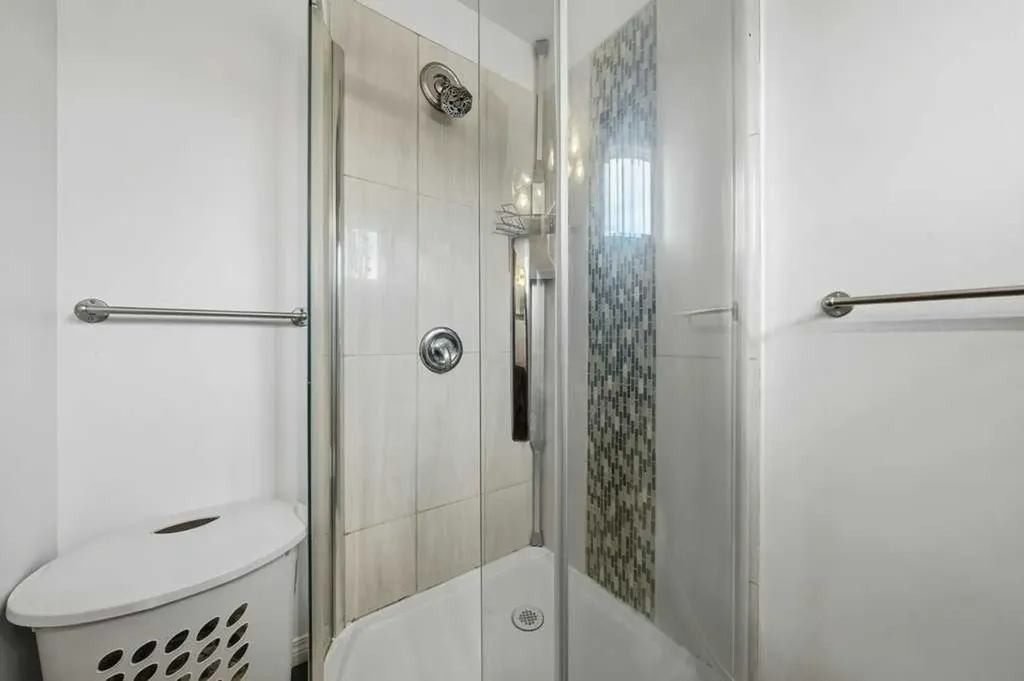 112 Cedargrove Way SW Calgary AB T2W 4V2