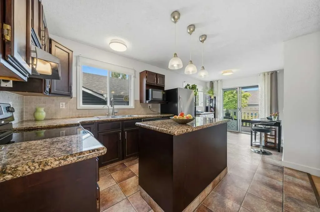 112 Cedargrove Way SW Calgary AB T2W 4V2