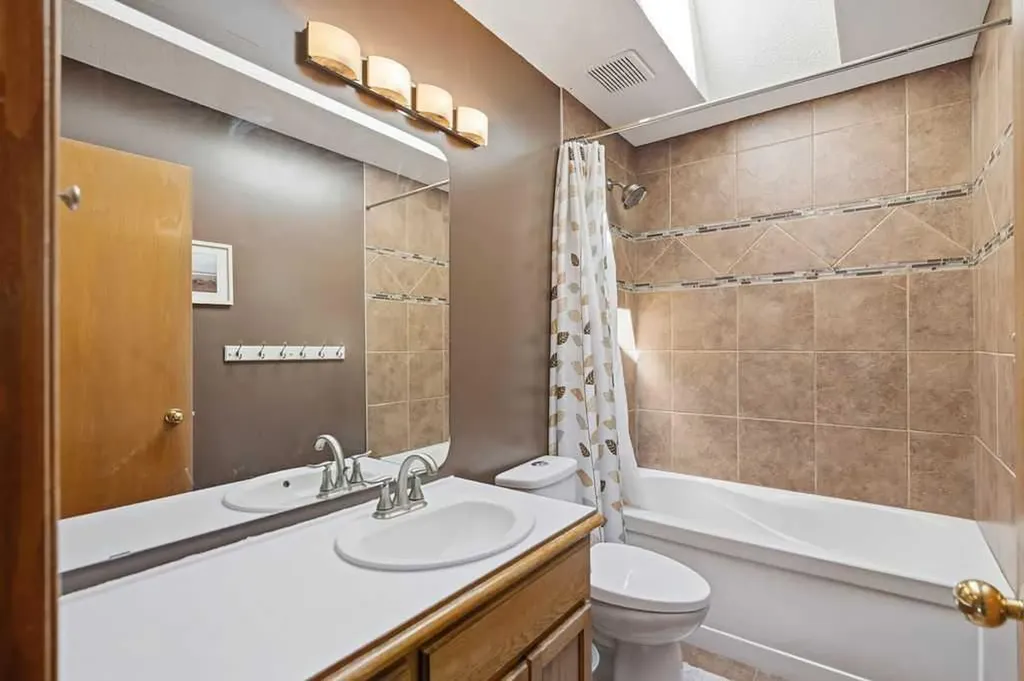 145 Straddock Crescent SW Calgary AB T3H 2S8
