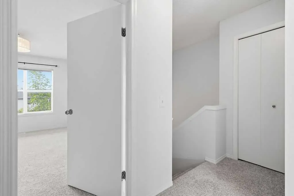 77 Elgin Gardens SE Calgary AB T2Z 4T4