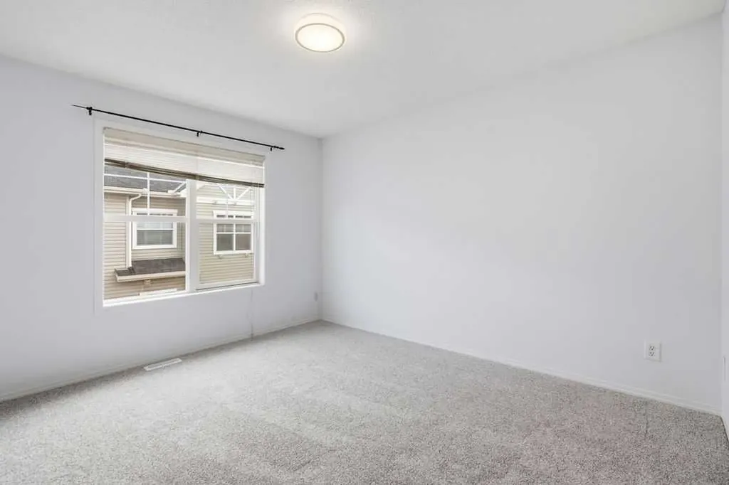77 Elgin Gardens SE Calgary AB T2Z 4T4