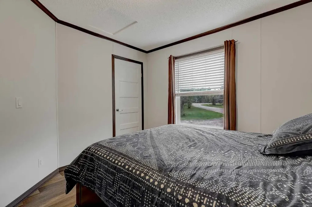 1 744018 Range Road 63 Sexsmith AB T0H 3C0