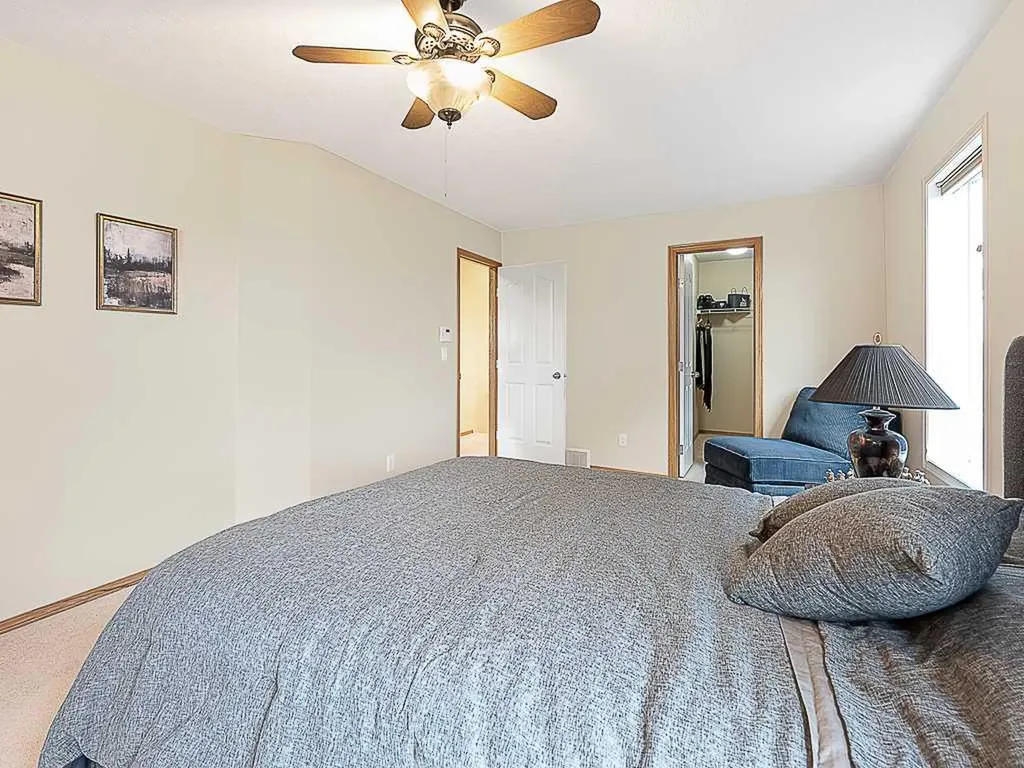 143 Cougarstone Square SW Calgary AB T3H 5J4