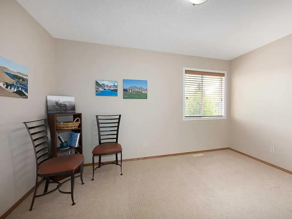 143 Cougarstone Square SW Calgary AB T3H 5J4