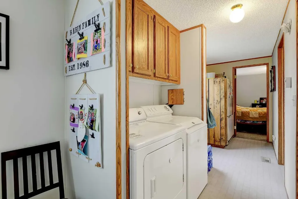 10301 99 Avenue Bezanson AB T0H0G0