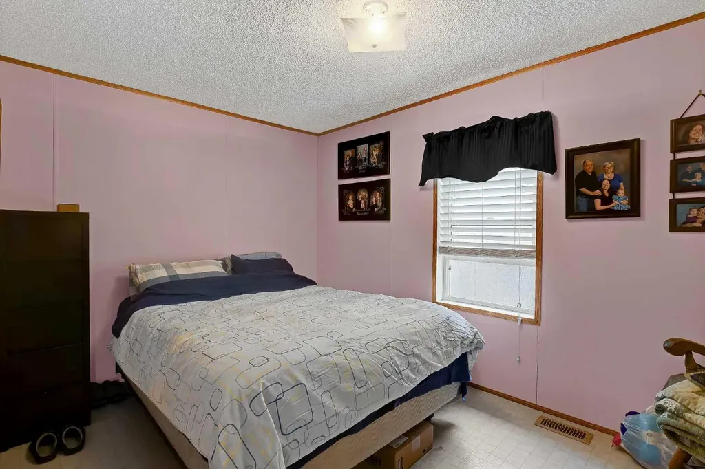 10301 99 Avenue Bezanson AB T0H0G0