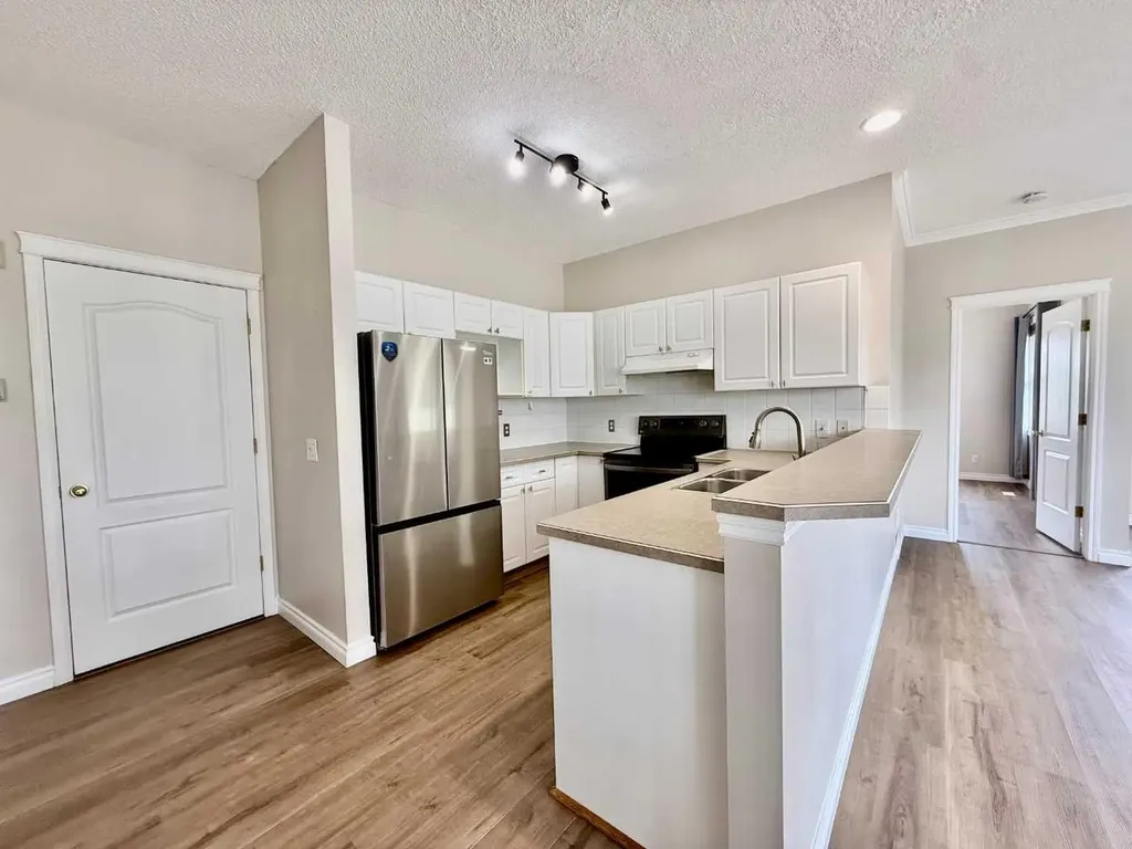 102 Prestwick Gardens SE Calgary AB T2Z 3V4