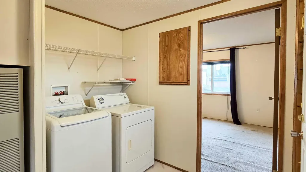 118 Parkland Acres Lacombe AB T4L 1S8