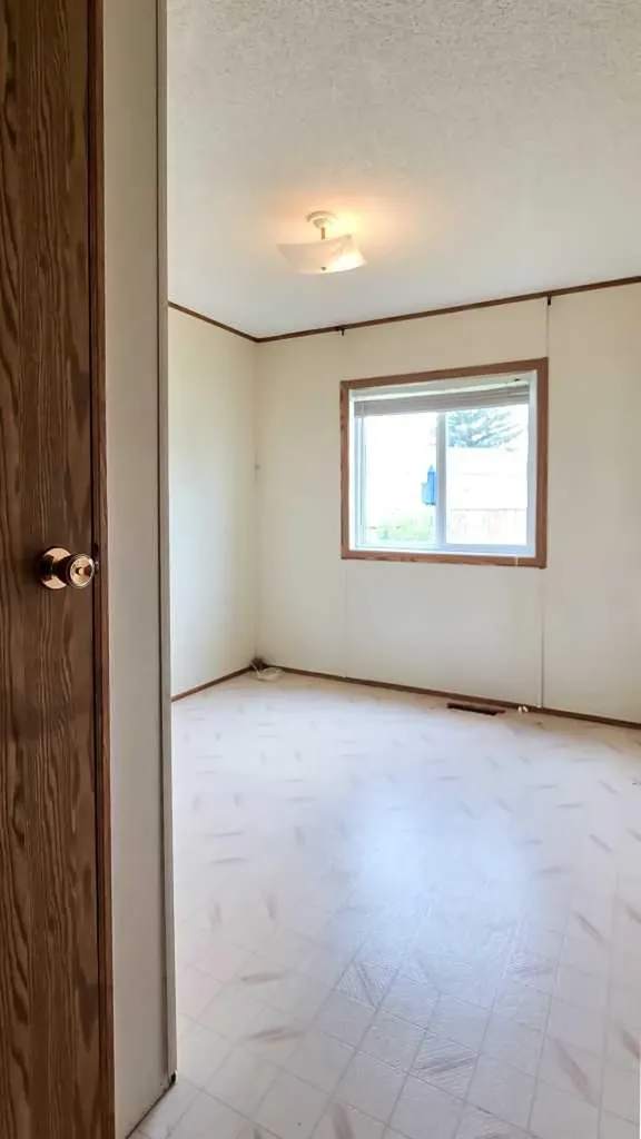 118 Parkland Acres Lacombe AB T4L 1S8