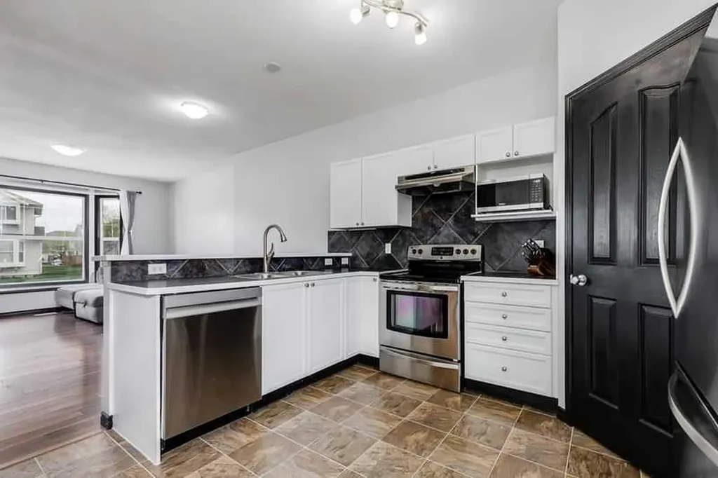 703 Luxstone Square SE Airdrie AB T4B 0A4