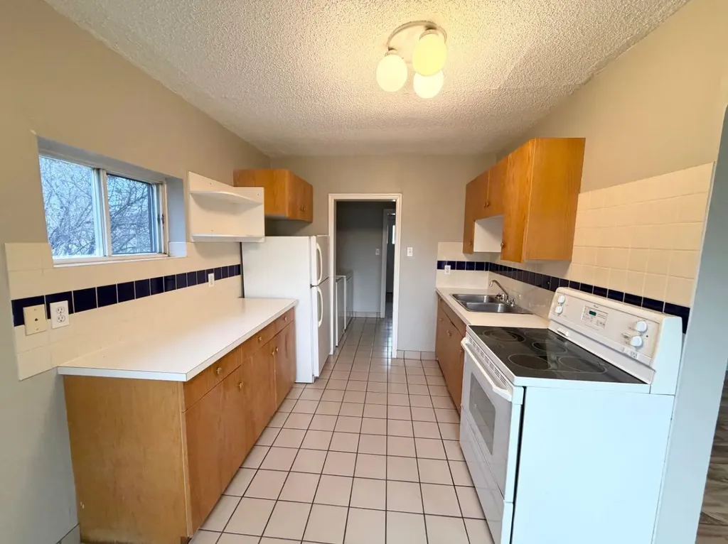 9516 102 Avenue Grande Prairie AB T8V 0Z6