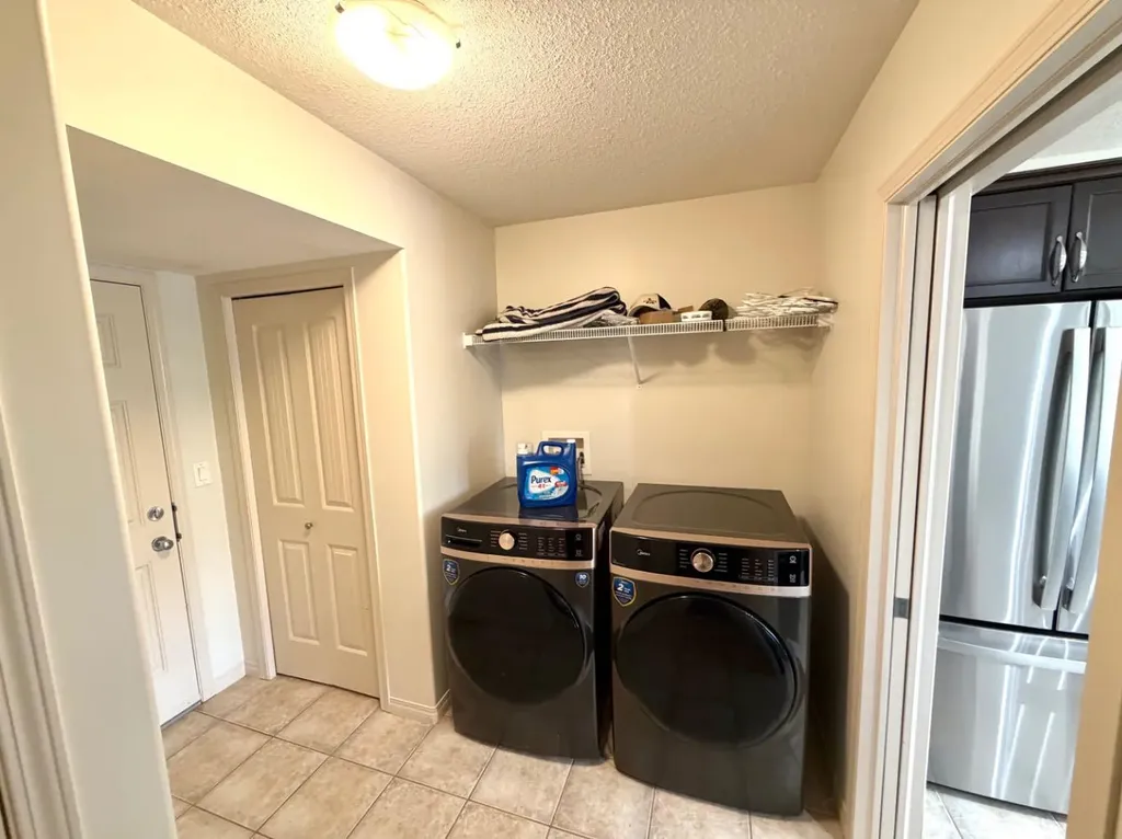 8829 89 Avenue Grande Prairie AB T8X 0C6