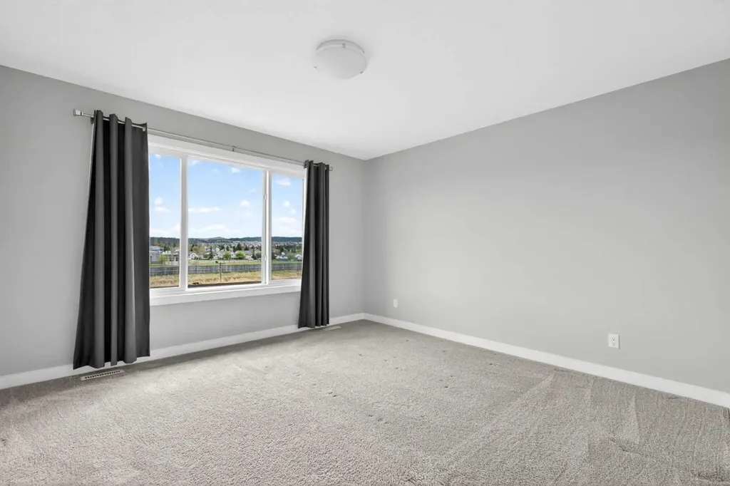 181 Buckskin Way Cochrane AB T4C 2R7