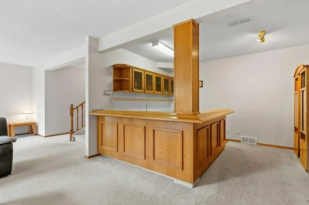 125 Woodpark Close SW Calgary AB T2W 6H1