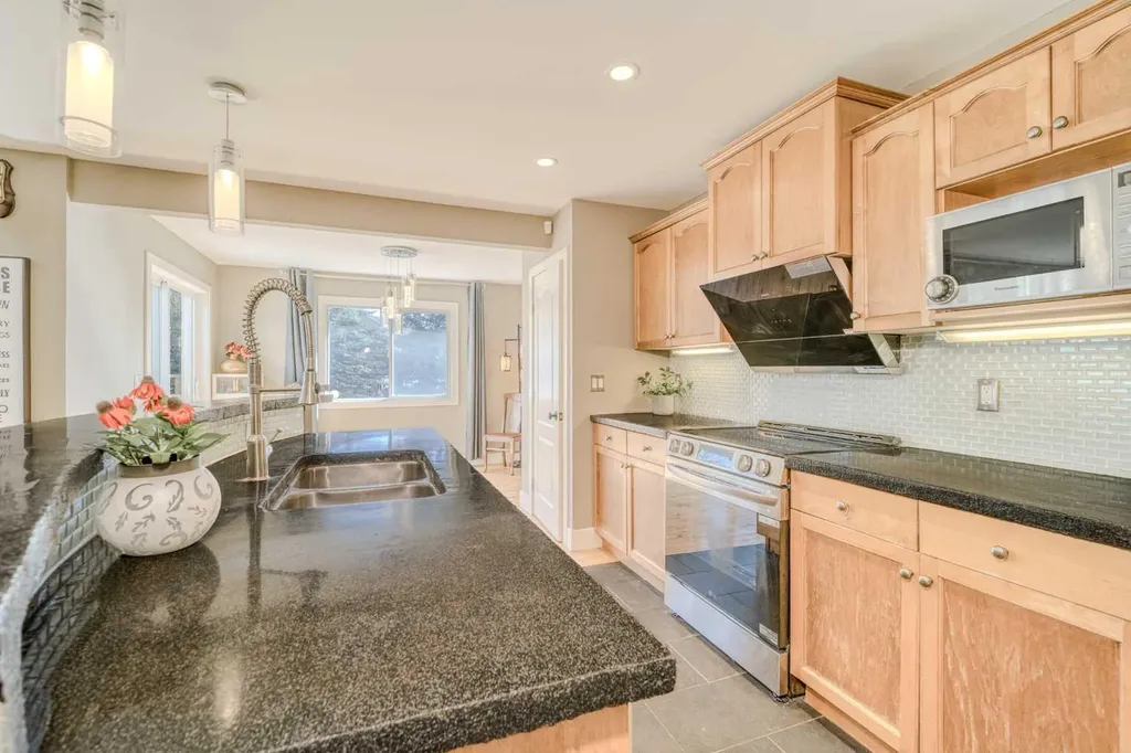 100 Royal Birch Crescent NW Calgary AB T3G 5N8
