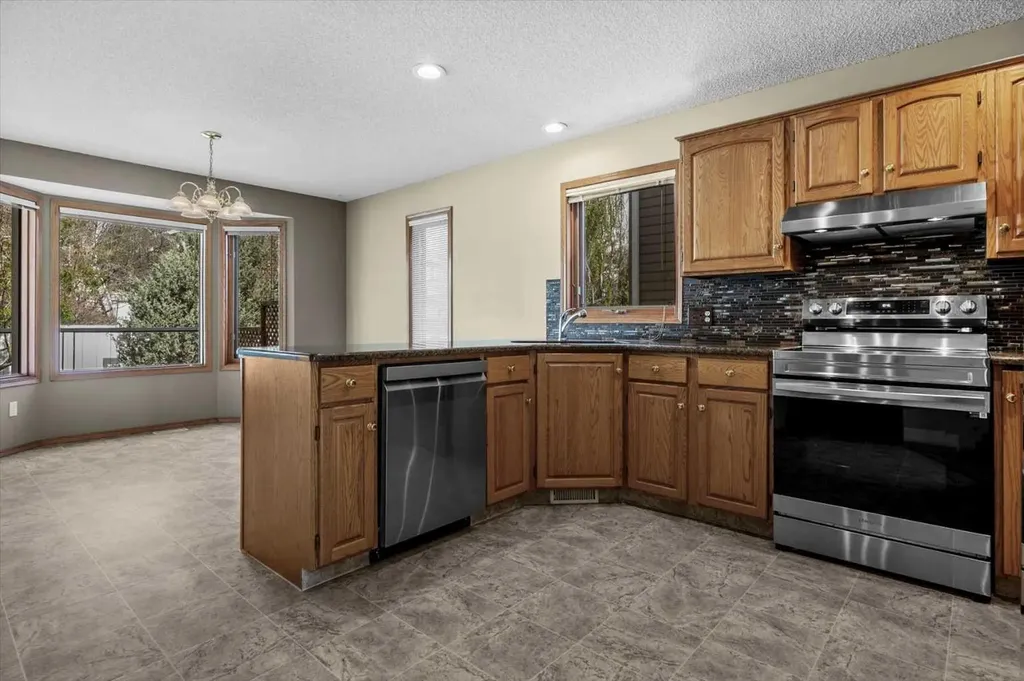 100 Macewan Park Manor NW Calgary AB T3K 4G6