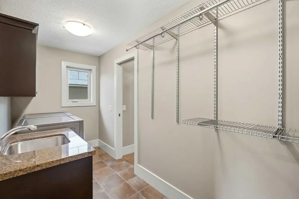 214 Aspen Glen Place SW Calgary AB T3H 0E8