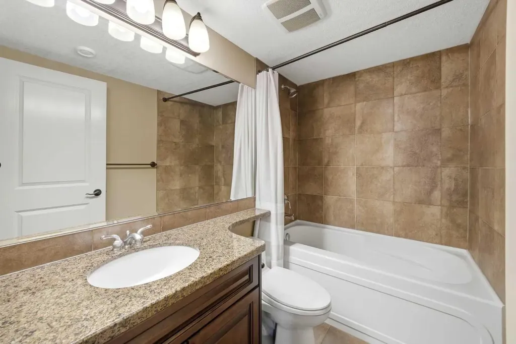 214 Aspen Glen Place SW Calgary AB T3H 0E8