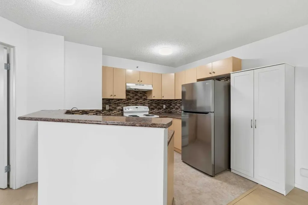 8 Bridlecrest Drive SW Calgary AB T2Y 0H7