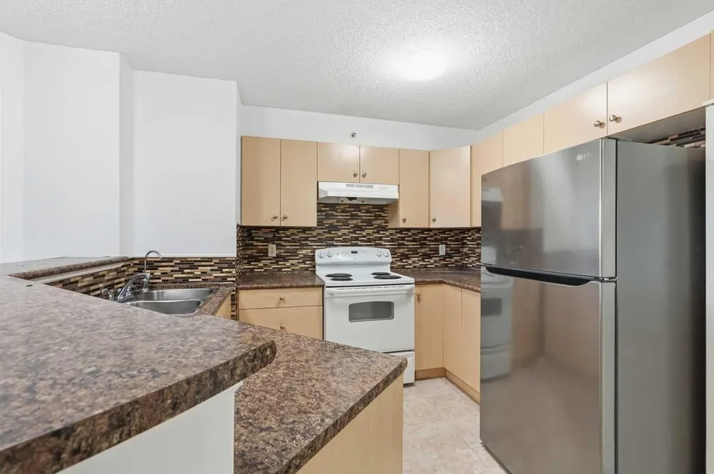 8 Bridlecrest Drive SW Calgary AB T2Y 0H7