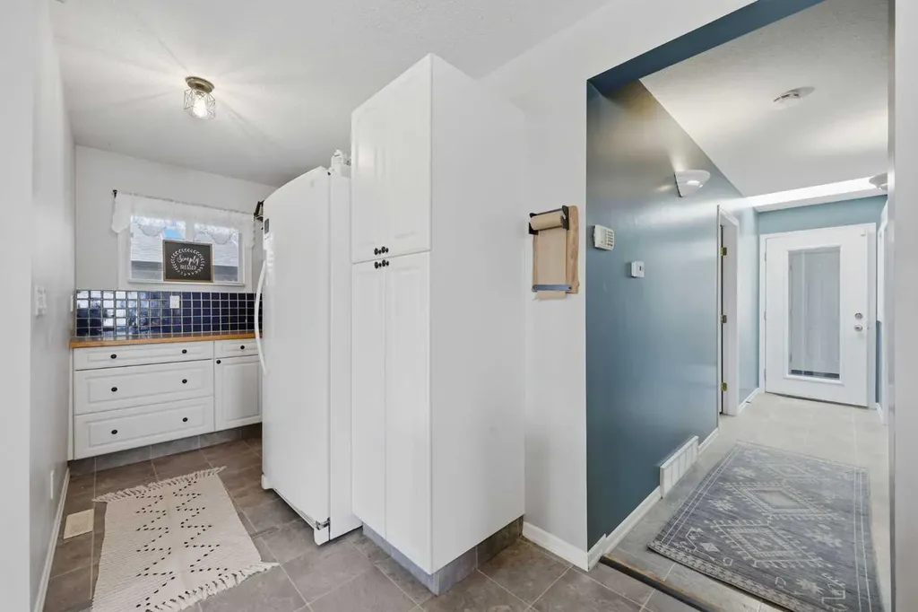 118 Frontenac Avenue NW Diamond Valley AB T0L 2A0