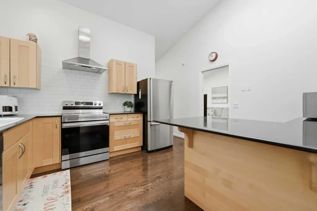 84 Coach Gate Way SW Calgary AB T3H 1Z7