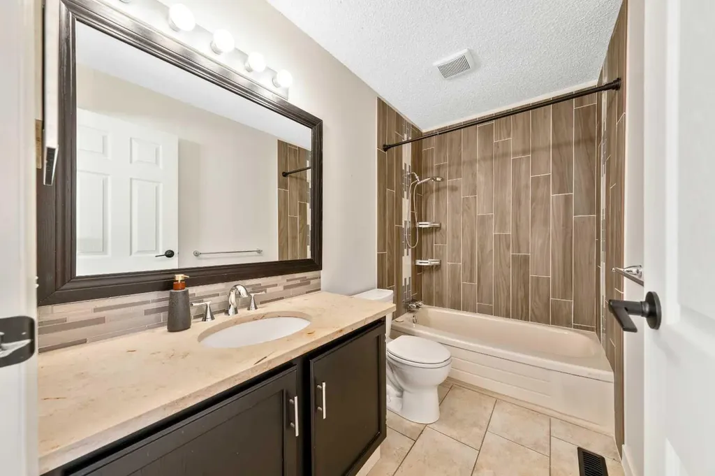100 Woodfield Green SW Calgary AB T2W 3T9