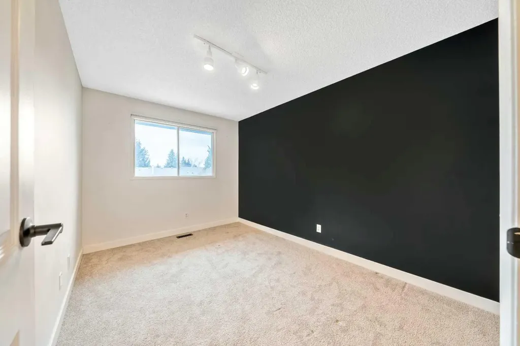 100 Woodfield Green SW Calgary AB T2W 3T9