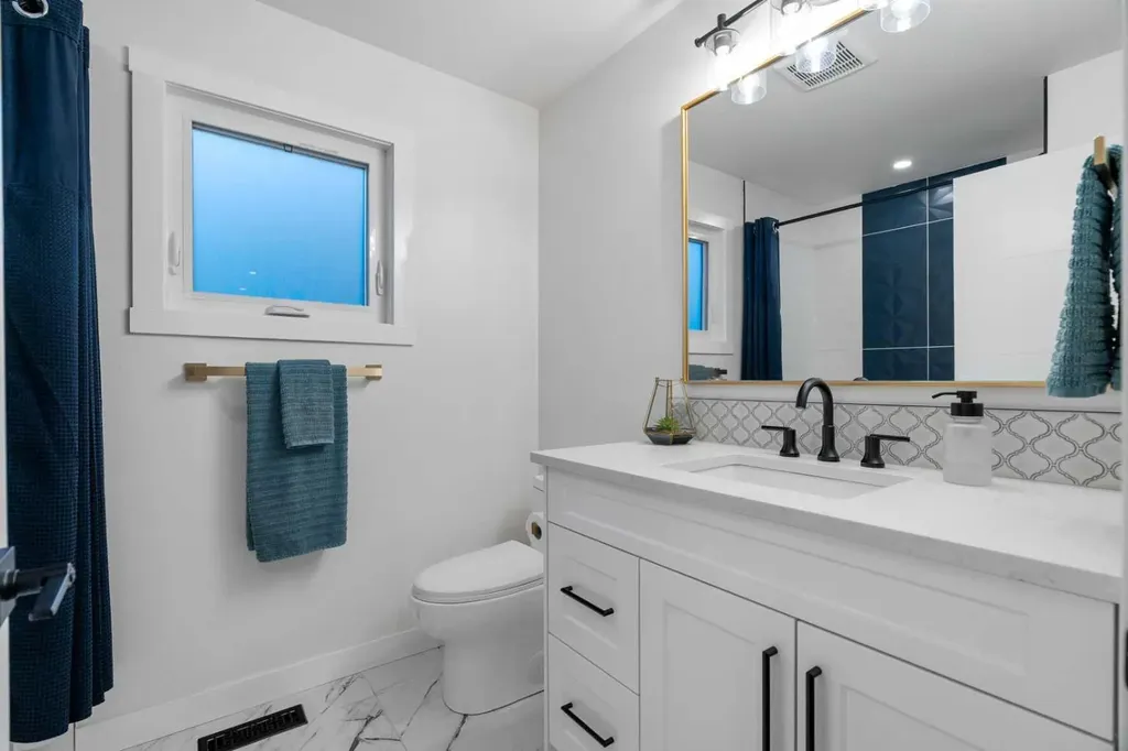 128 Lake Moraine Place SE Calgary AB T2J 2Y7