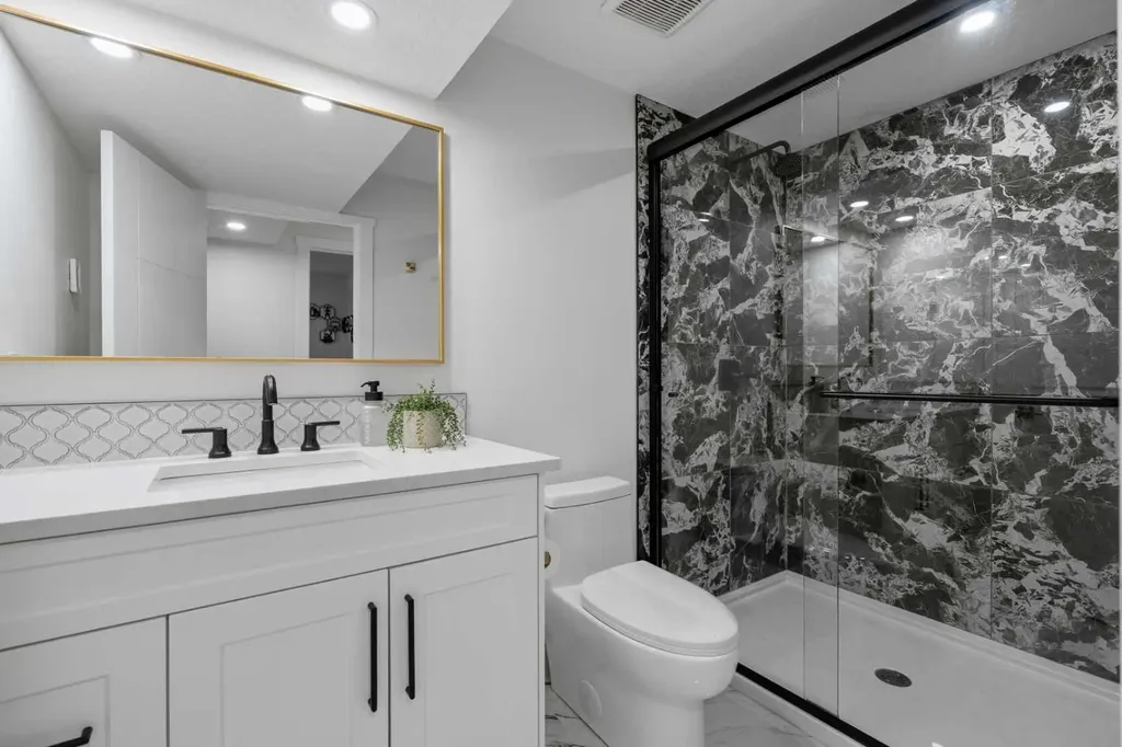 128 Lake Moraine Place SE Calgary AB T2J 2Y7