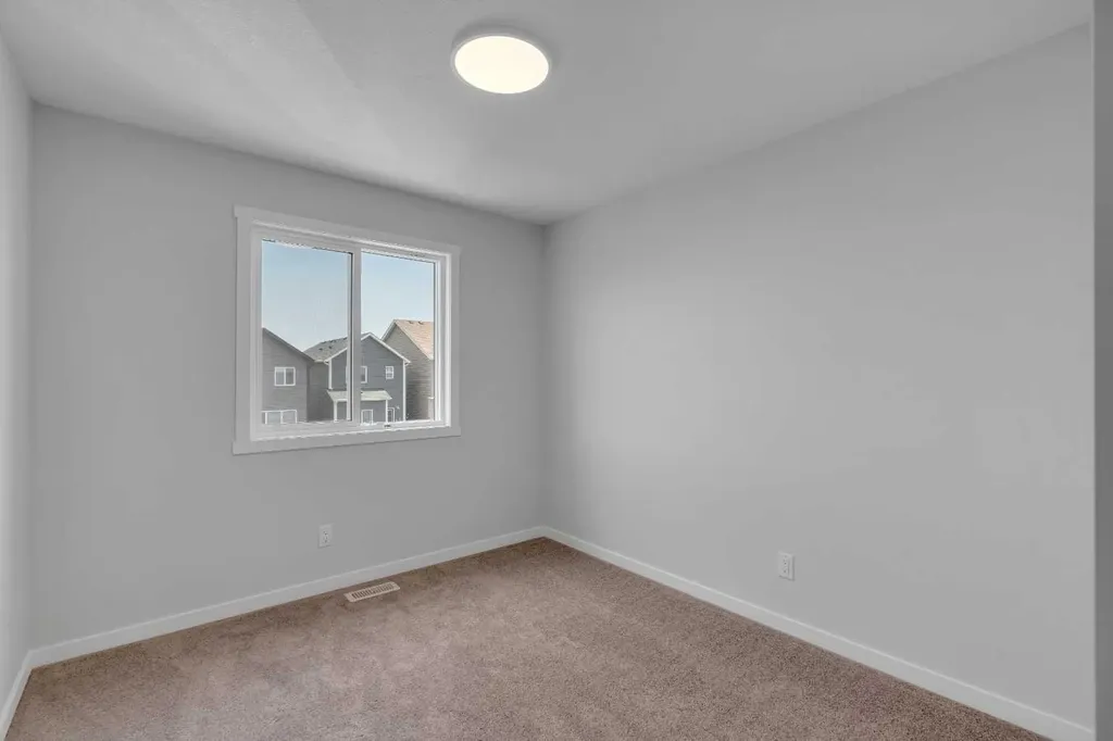 76 Heirloom Drive SE Calgary AB T3M 2M6