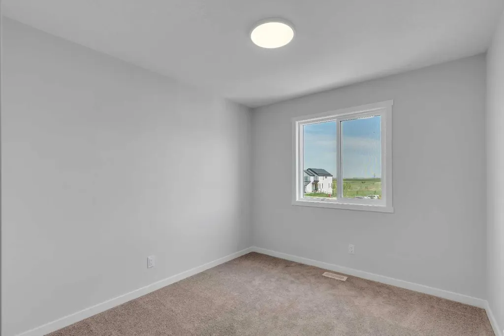 76 Heirloom Drive SE Calgary AB T3M 2M6