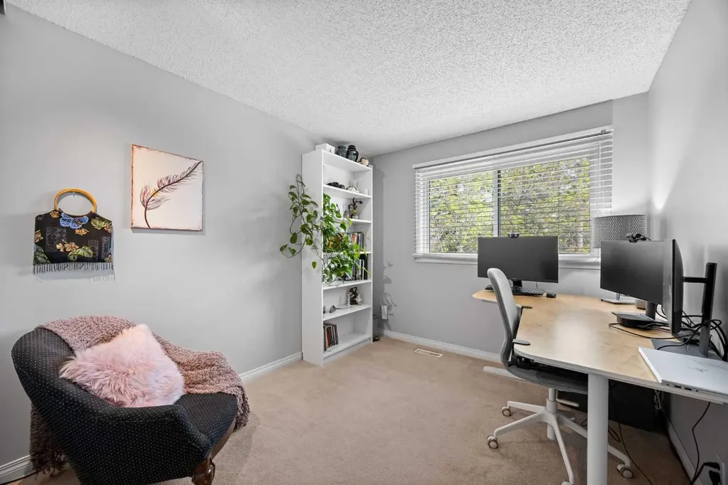 165 Woodmont Terrace SW Calgary AB T2W 4Z4