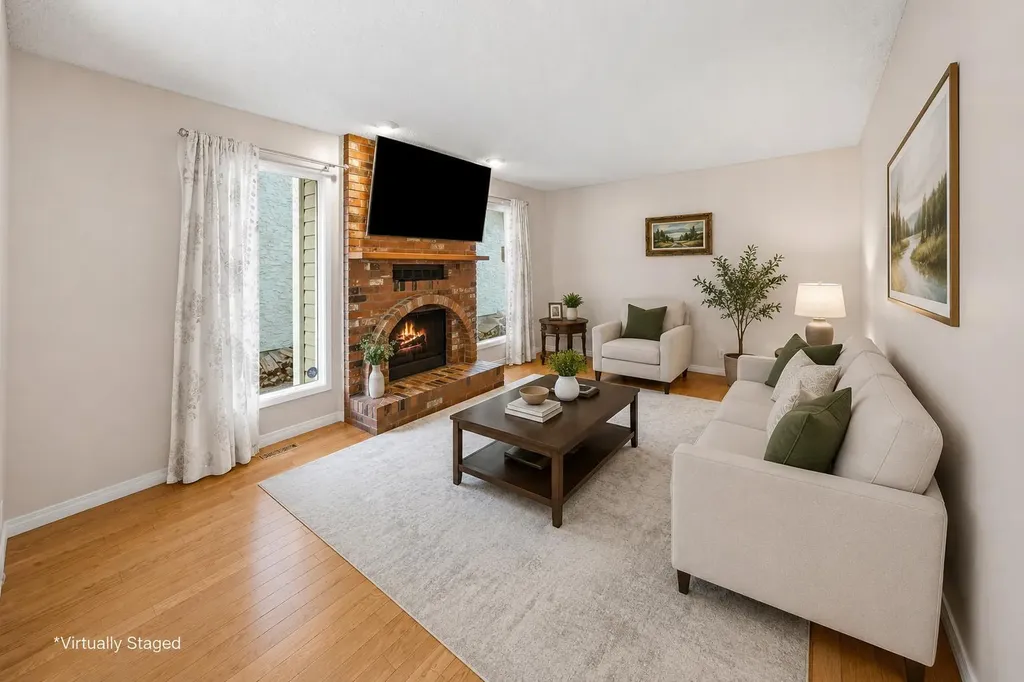 39 Woodmont Way SW Calgary AB T2W 4L7