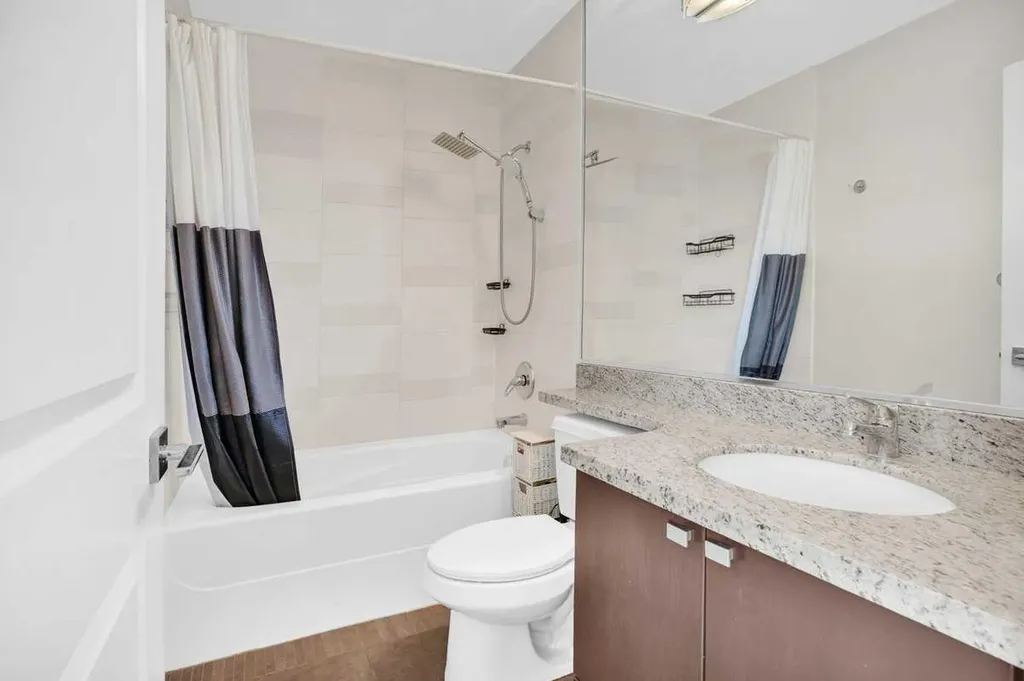 77 Spruce Place SW Calgary AB T3C 3X6
