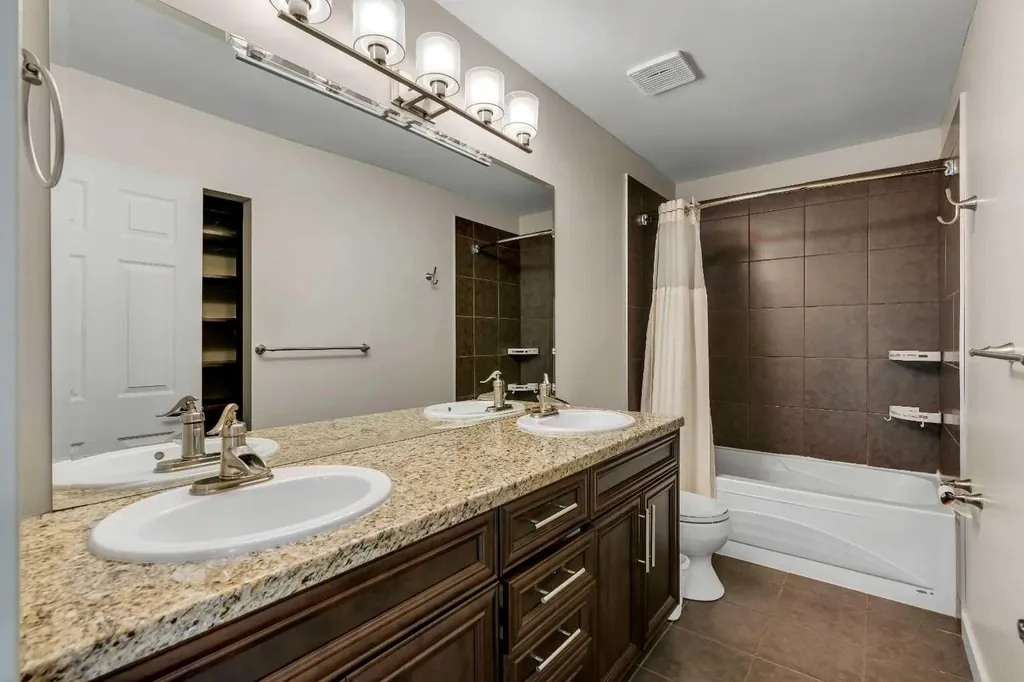19 Coach Gate Way SW Calgary AB T3H 1L7