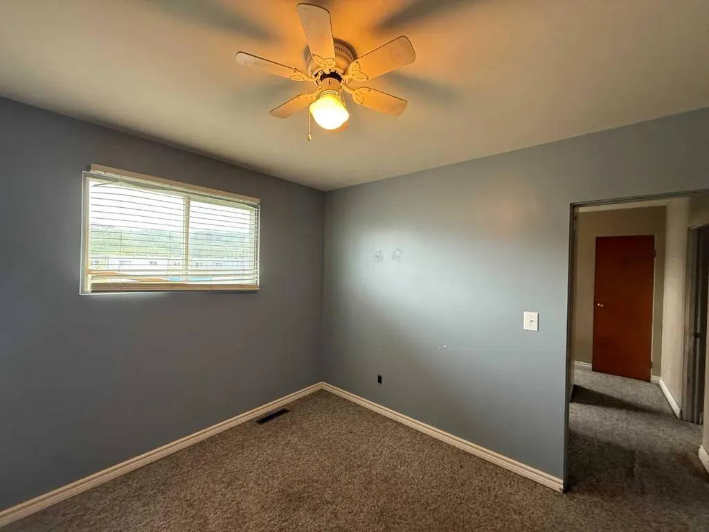 9507 89 Avenue Peace River AB T8S 1G7