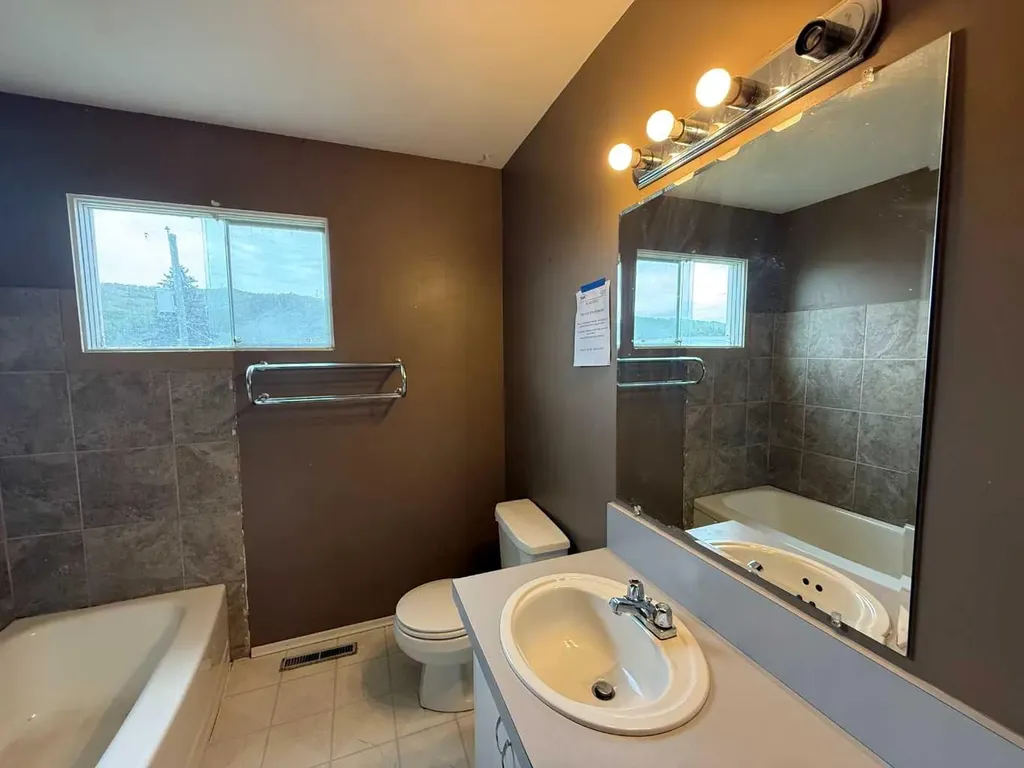 9507 89 Avenue Peace River AB T8S 1G7