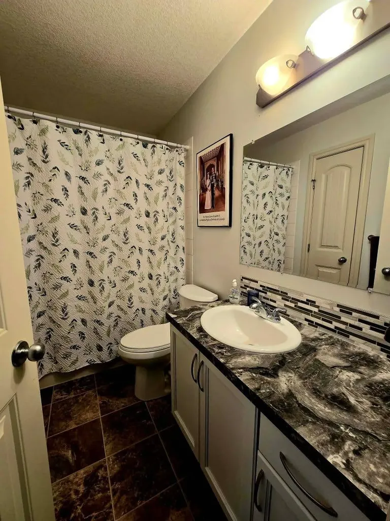 8563 69 Avenue Grande Prairie AB T8X 0C8