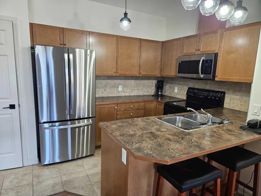 92 Crystal Shores Road Okotoks AB T1S 2M8