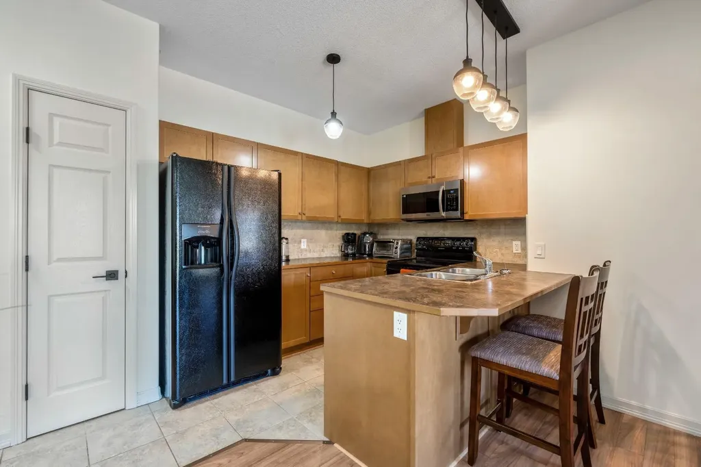 92 Crystal Shores Road Okotoks AB T1S 2M8