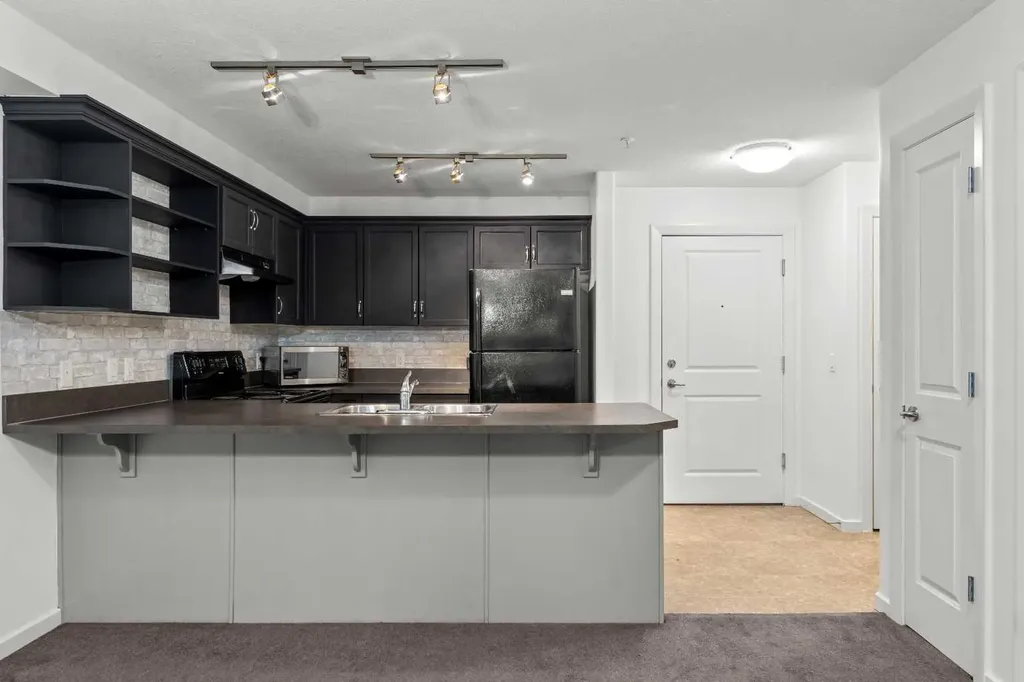 310 Mckenzie Towne Gate SE Calgary AB T2Z 1A6