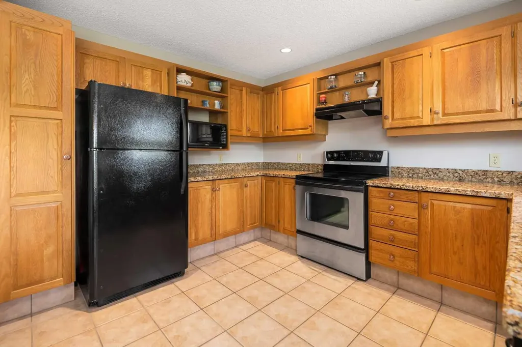 185 Woodridge Drive SW Calgary AB T2W 3X7