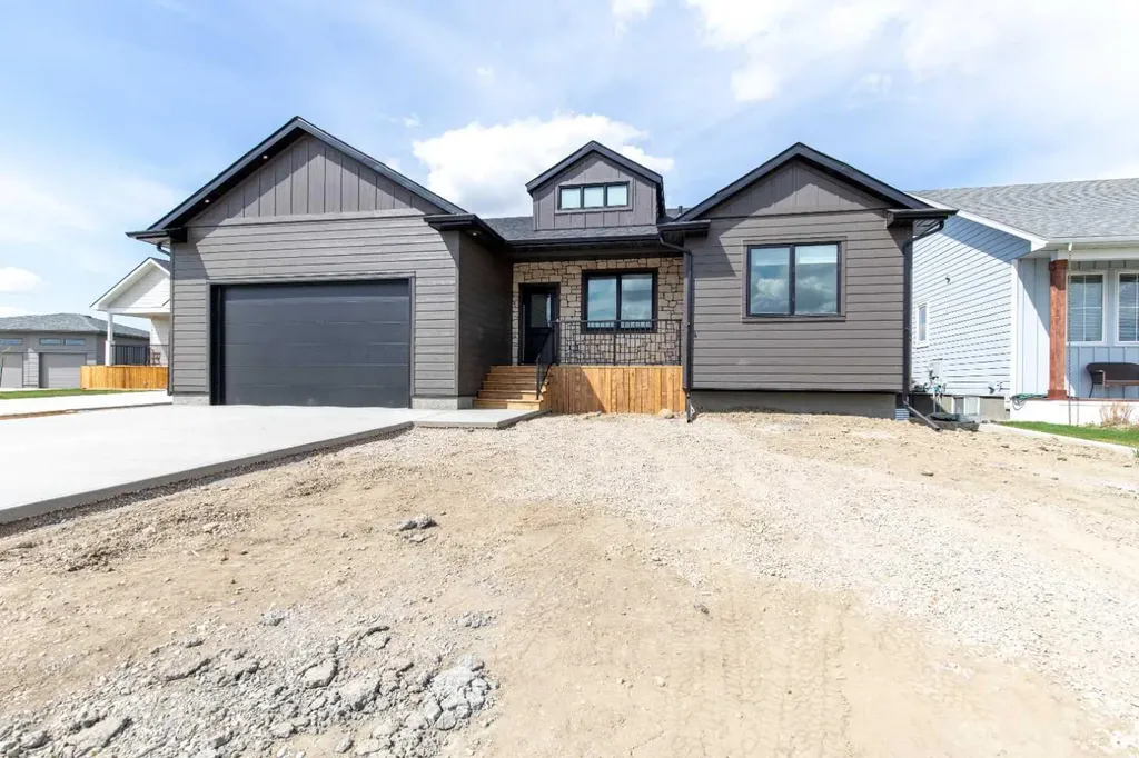 306 Bridge Crossing Close Raymond AB T0K 2S0