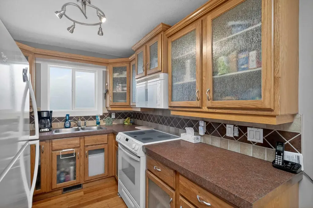 13 Taraglen Road NE Calgary AB T3J 2N7